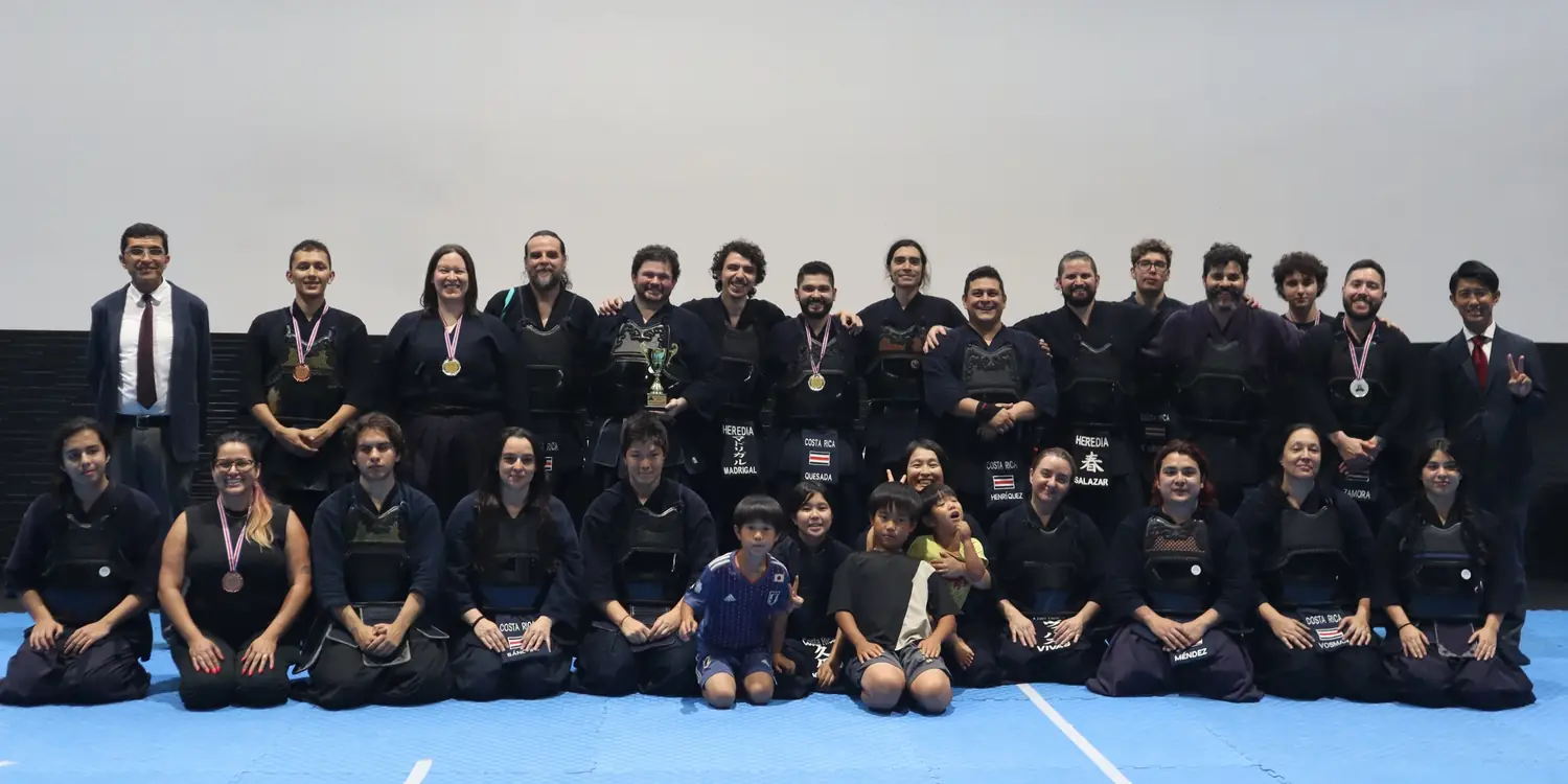 Group of kendo practitioners gathered after an activity
